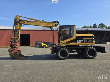 Bager točkaš CATERPILLAR M315