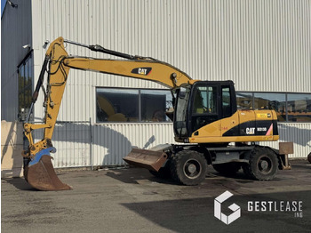 Bager točkaš CATERPILLAR M313D