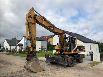 Bager točkaš CAT M320: slika 2