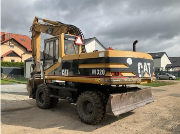 Bager točkaš CAT M320: slika 3