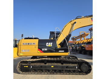 Bager CATERPILLAR 323DL