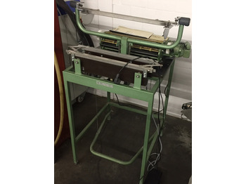 Mašina za uvezivanje knjiga