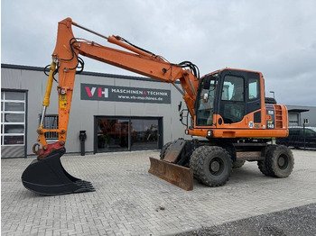 Bager točkaš KOMATSU PW148-8