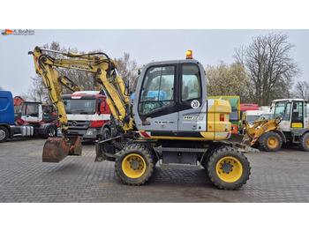 Bager točkaš NEW HOLLAND