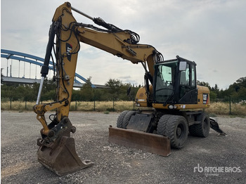 Bager točkaš CATERPILLAR M313D