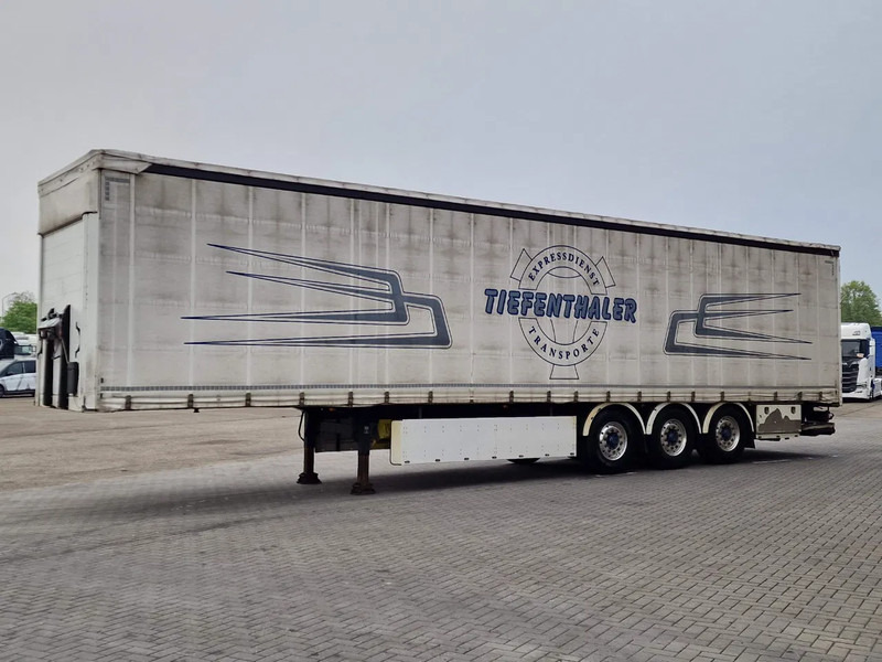 Schwarzmüller Tautliner 3 axle - Loadlift - Lift axle - BPW Axle - Lift axle - Alloy wheels - Poluprikolica sa ceradom: slika 3 Schwarzmüller Tautliner 3 axle - Loadlift - Lift axle - BPW Axle - Lift axle - Alloy wheels - Poluprikolica sa ceradom: slika 3
