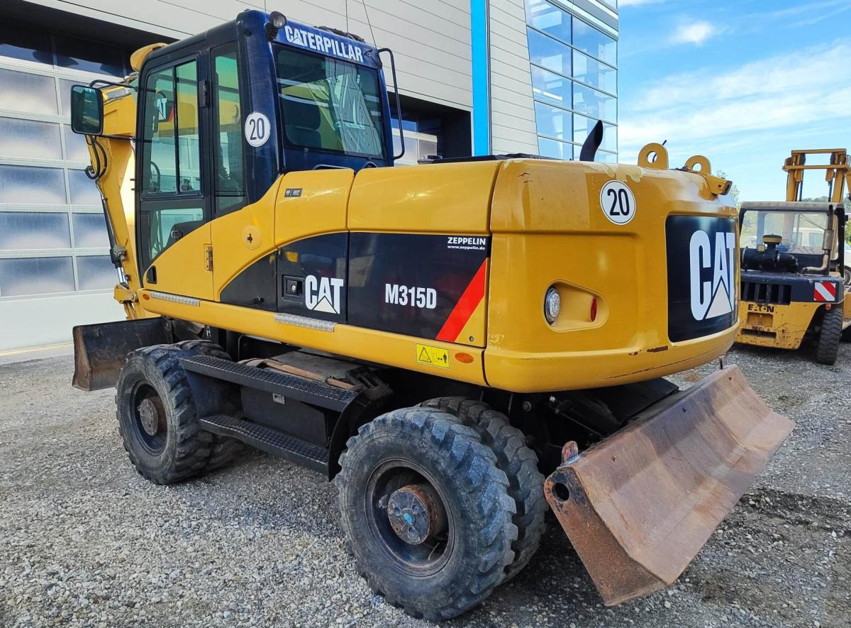Caterpillar M315D - Bager točkaš: slika 1 Caterpillar M315D - Bager točkaš: slika 1