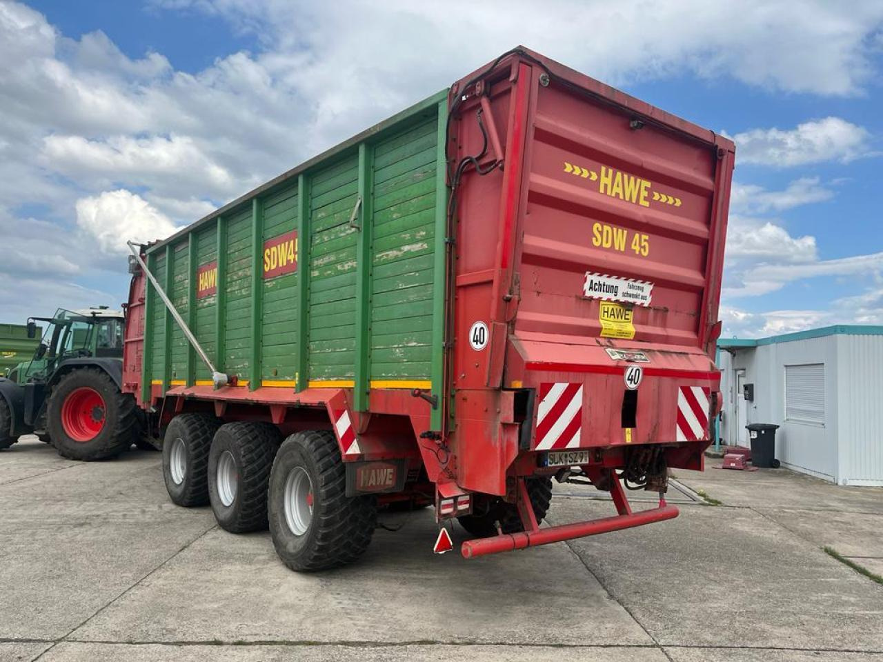 HAWE Tridem SDW 45T mit Heckentleerung - Traktorska prikolica za farmu/ Kiper: slika 4 HAWE Tridem SDW 45T mit Heckentleerung - Traktorska prikolica za farmu/ Kiper: slika 4