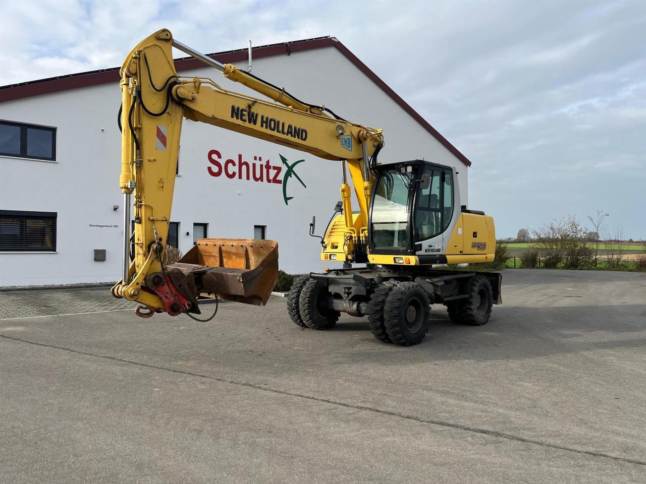 New Holland MH 5.6 inkl. Grabenlöffel, Tieflöffel - Bager točkaš: slika 1 New Holland MH 5.6 inkl. Grabenlöffel, Tieflöffel - Bager točkaš: slika 1