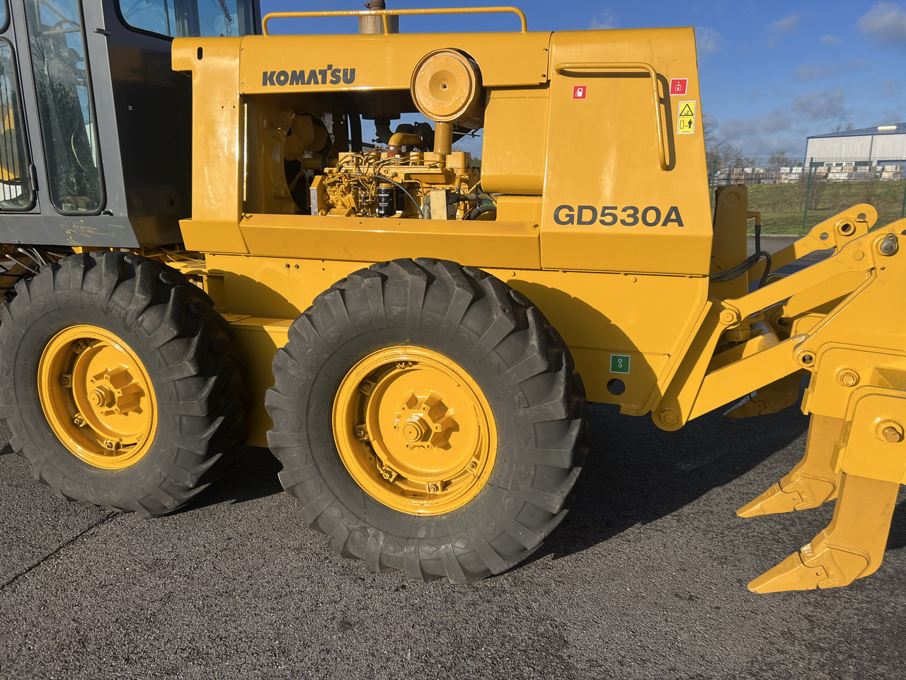 Grejder KOMATSU GD530A mit 5-Zahn-Heckaufreisser: slika 6 Grejder KOMATSU GD530A mit 5-Zahn-Heckaufreisser: slika 6