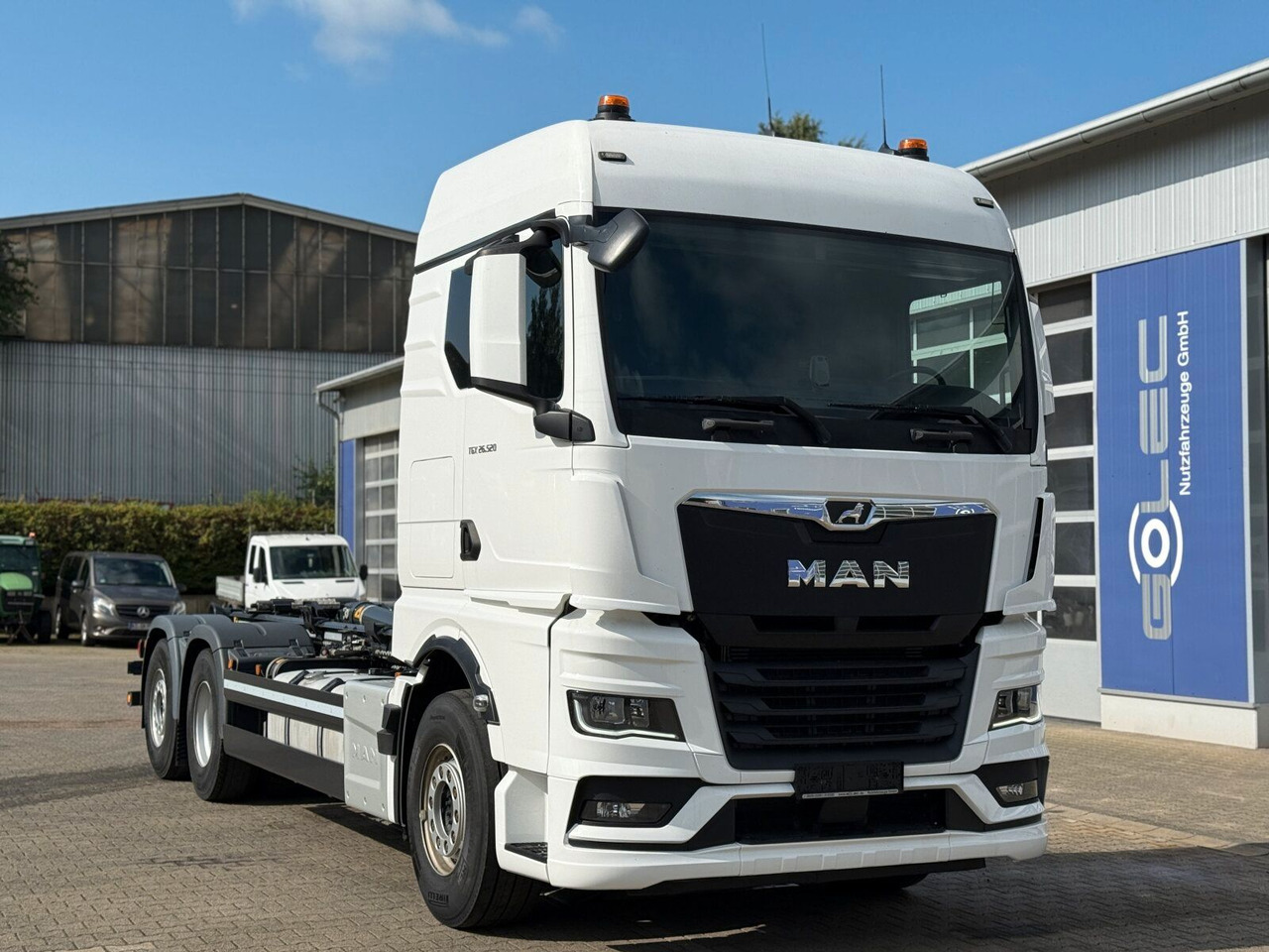 MAN TGX 26.520 6x2 Abrollkipper MEILLER RS 21.70 - Kamion sa hidrauličnom kukom: slika 1 MAN TGX 26.520 6x2 Abrollkipper MEILLER RS 21.70 - Kamion sa hidrauličnom kukom: slika 1