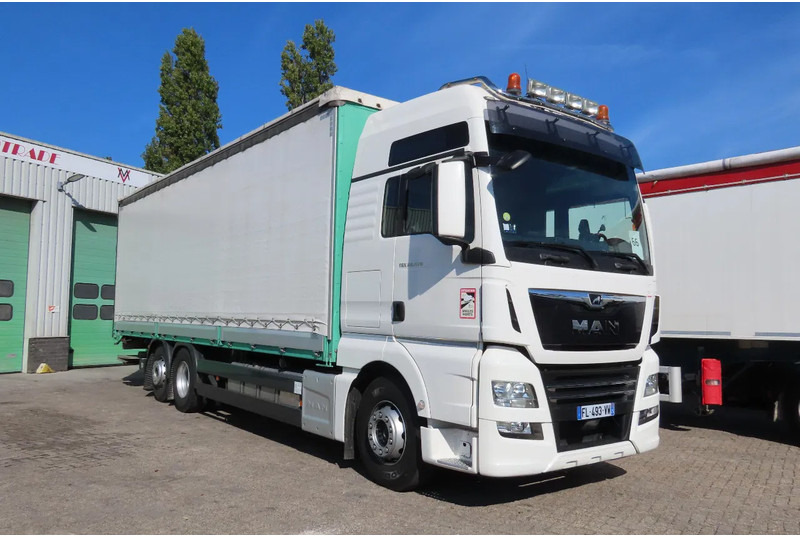 MAN TGX 26.470 ' AS NEW' condition, lift axel, moving axel, edscha, video back, etc, etc, etc - Kamion sa ceradom: slika 1 MAN TGX 26.470 ' AS NEW' condition, lift axel, moving axel, edscha, video back, etc, etc, etc - Kamion sa ceradom: slika 1