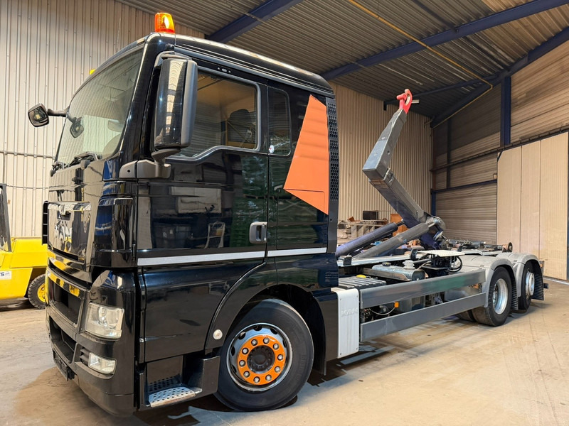 MAN TGX 26.400 6X2 + HOOKLIFT PALIFT 20T - LIFT + STEERING AXLE - EURO 5 - SLEEPERCAB - BE TRUCK - Kamion sa hidrauličnom kukom: slika 1 MAN TGX 26.400 6X2 + HOOKLIFT PALIFT 20T - LIFT + STEERING AXLE - EURO 5 - SLEEPERCAB - BE TRUCK - Kamion sa hidrauličnom kukom: slika 1