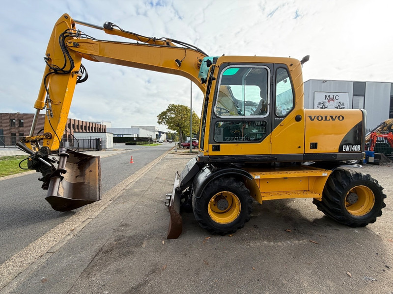 Volvo EW 140 B *FULL HYDR* - BLADE - 10.485h - TILT BUCKET - CE - NL MACHINE - GOOD CONDITION - Bager točkaš: slika 5 Volvo EW 140 B *FULL HYDR* - BLADE - 10.485h - TILT BUCKET - CE - NL MACHINE - GOOD CONDITION - Bager točkaš: slika 5