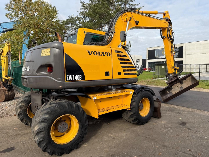 Volvo EW 140 B *FULL HYDR* - BLADE - 10.485h - TILT BUCKET - CE - NL MACHINE - GOOD CONDITION - Bager točkaš: slika 3 Volvo EW 140 B *FULL HYDR* - BLADE - 10.485h - TILT BUCKET - CE - NL MACHINE - GOOD CONDITION - Bager točkaš: slika 3