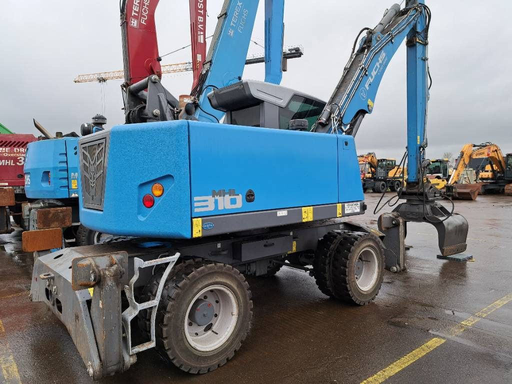 Fuchs MHL310F + Grapple - Bager za obradu otpada/ Industrije: slika 1 Fuchs MHL310F + Grapple - Bager za obradu otpada/ Industrije: slika 1