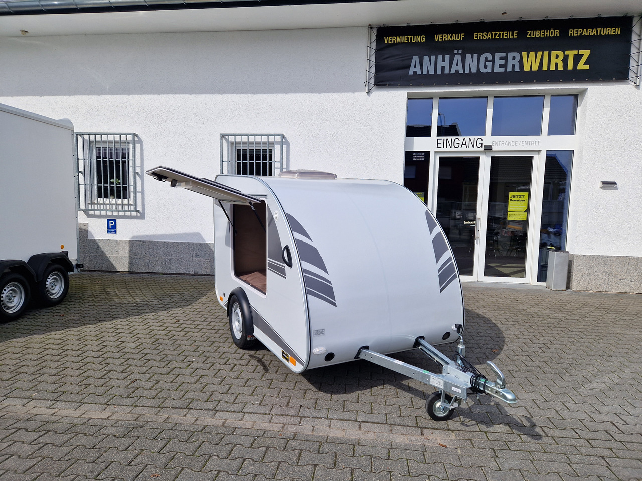 Mini Camper Mini Tommy TMC25 Basic 252x140x121cm 100 km/H 750kg ungebremst Januar AKTION - Kamp prikolica: slika 1 Mini Camper Mini Tommy TMC25 Basic 252x140x121cm 100 km/H 750kg ungebremst Januar AKTION - Kamp prikolica: slika 1