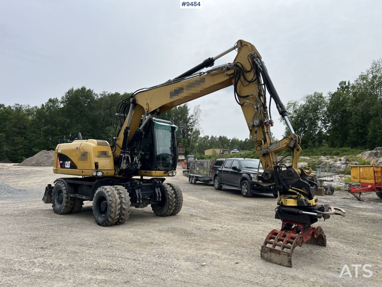 CAT M313D with tipping wagon and attachments (VIDEO) - Bager točkaš: slika 1 CAT M313D with tipping wagon and attachments (VIDEO) - Bager točkaš: slika 1