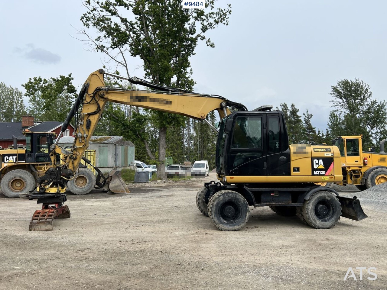 CAT M313D with tipping wagon and attachments (VIDEO) - Bager točkaš: slika 2 CAT M313D with tipping wagon and attachments (VIDEO) - Bager točkaš: slika 2