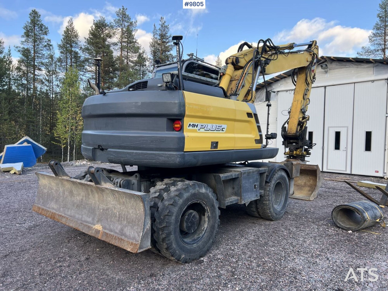New Holland, MH-Plus-C Wheel excavator with excavation system, rotor, and grader bucket - Bager točkaš: slika 4 New Holland, MH-Plus-C Wheel excavator with excavation system, rotor, and grader bucket - Bager točkaš: slika 4