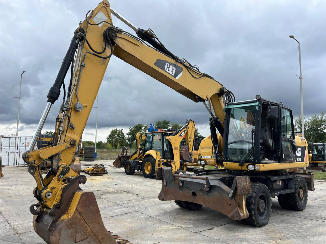 CAT M316D - Bager točkaš: slika 1 CAT M316D - Bager točkaš: slika 1