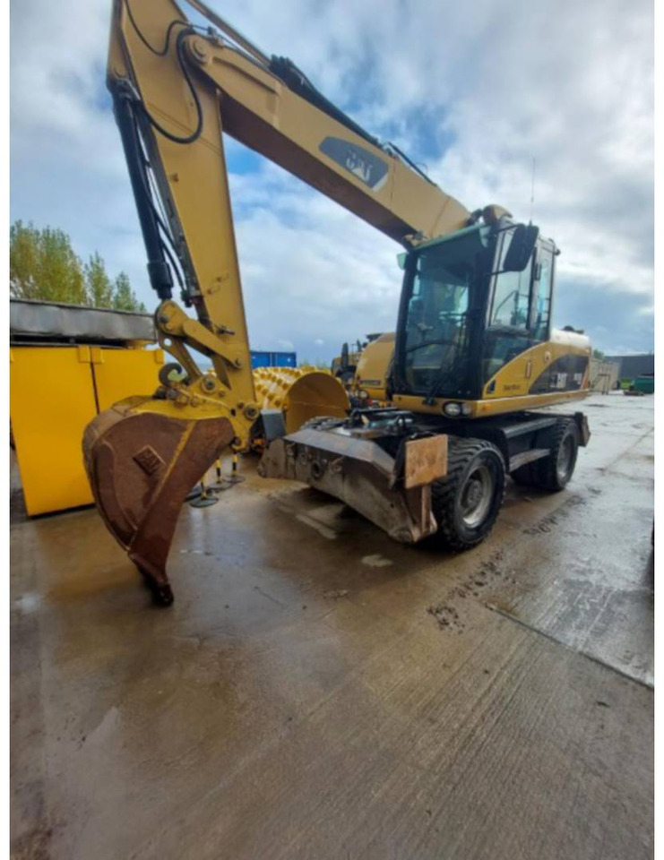 CAT M315D - Bager točkaš: slika 1 CAT M315D - Bager točkaš: slika 1