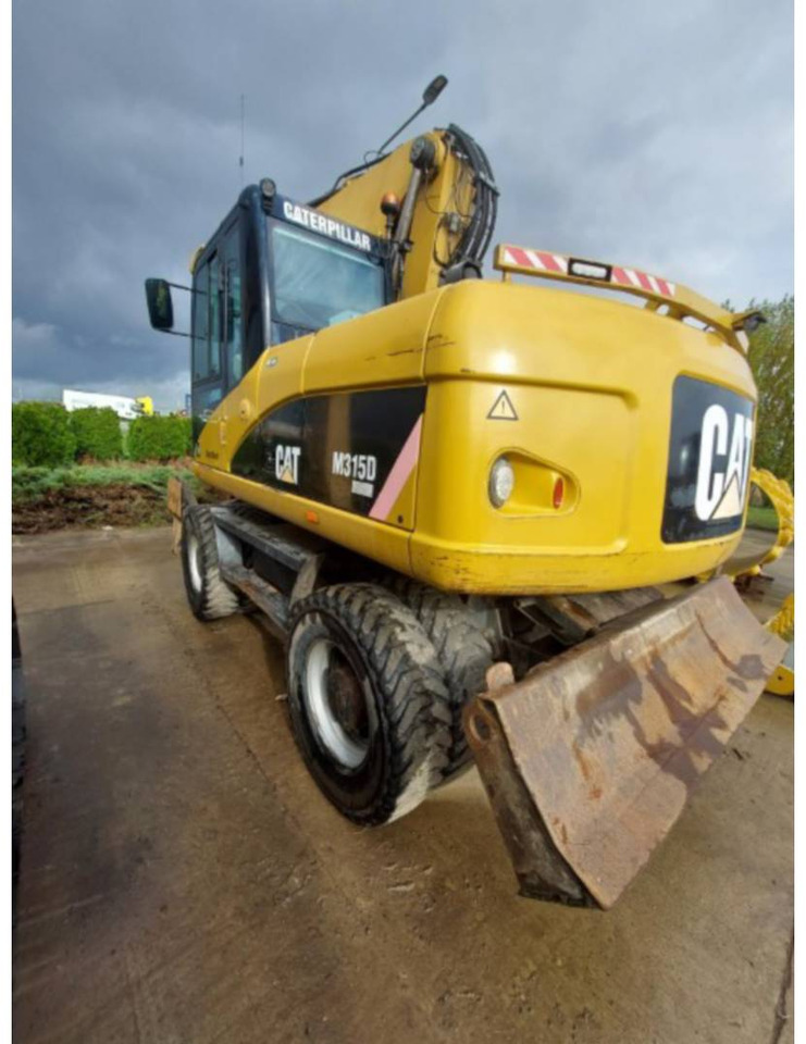 CAT M315D - Bager točkaš: slika 4 CAT M315D - Bager točkaš: slika 4