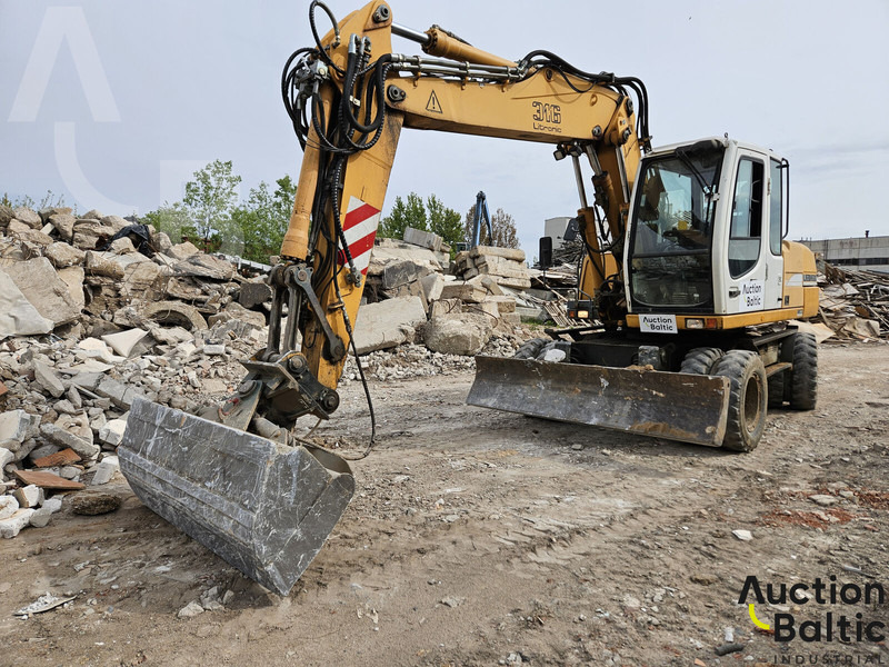 Liebherr A 316 Litronic - Bager točkaš: slika 1 Liebherr A 316 Litronic - Bager točkaš: slika 1