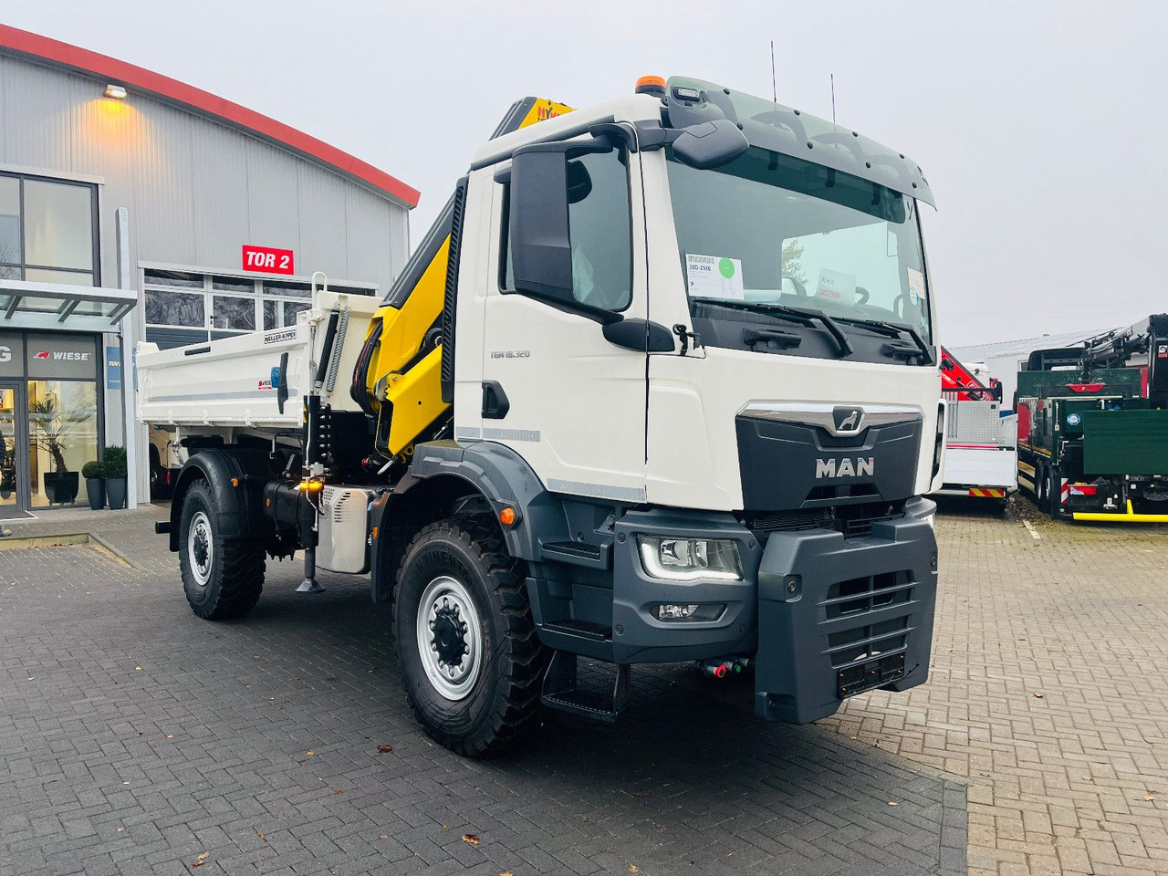 MAN TGM 18.320 4x4 BB Kipper Kran 131 Single Winter - Kamion sa dizalicom: slika 2 MAN TGM 18.320 4x4 BB Kipper Kran 131 Single Winter - Kamion sa dizalicom: slika 2