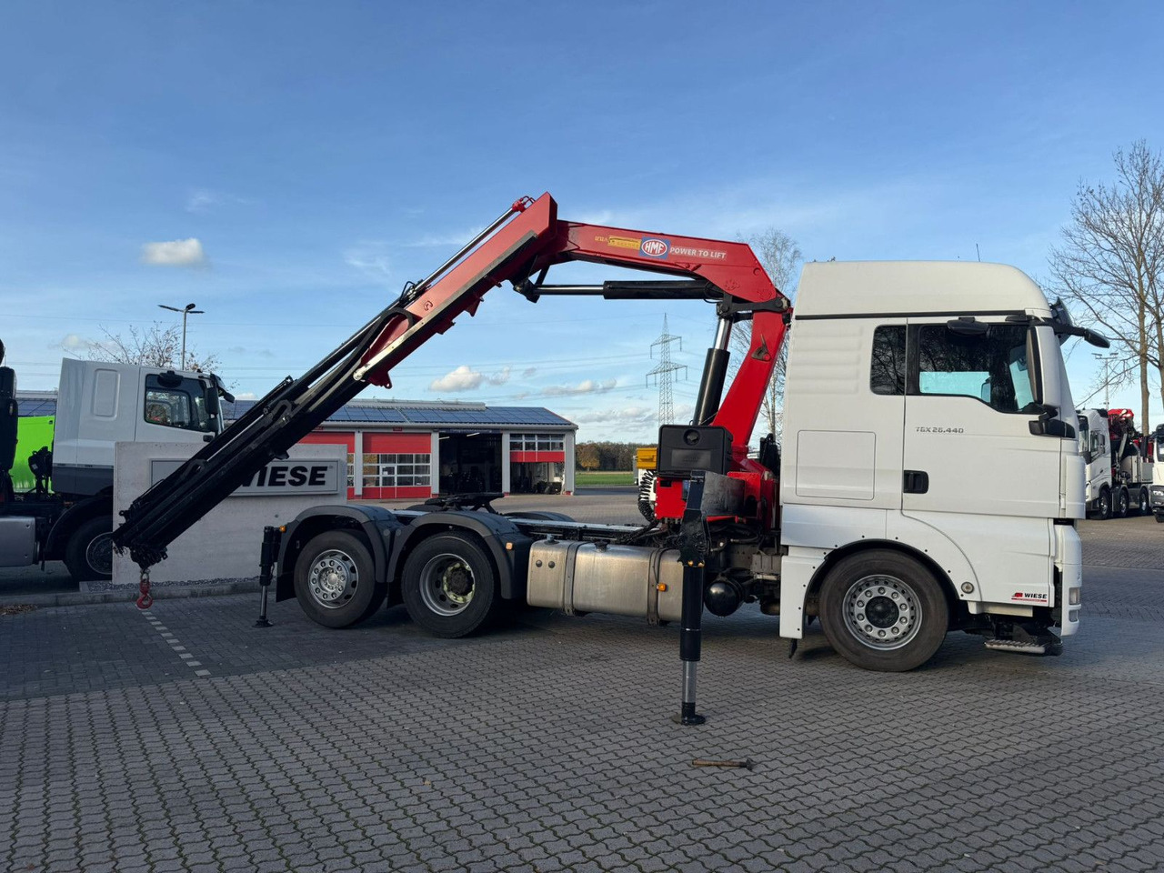 MAN TGX 26.440 6x2 mit HMF 3000-5 Kran Top Zustand - Kamion sa dizalicom: slika 1 MAN TGX 26.440 6x2 mit HMF 3000-5 Kran Top Zustand - Kamion sa dizalicom: slika 1