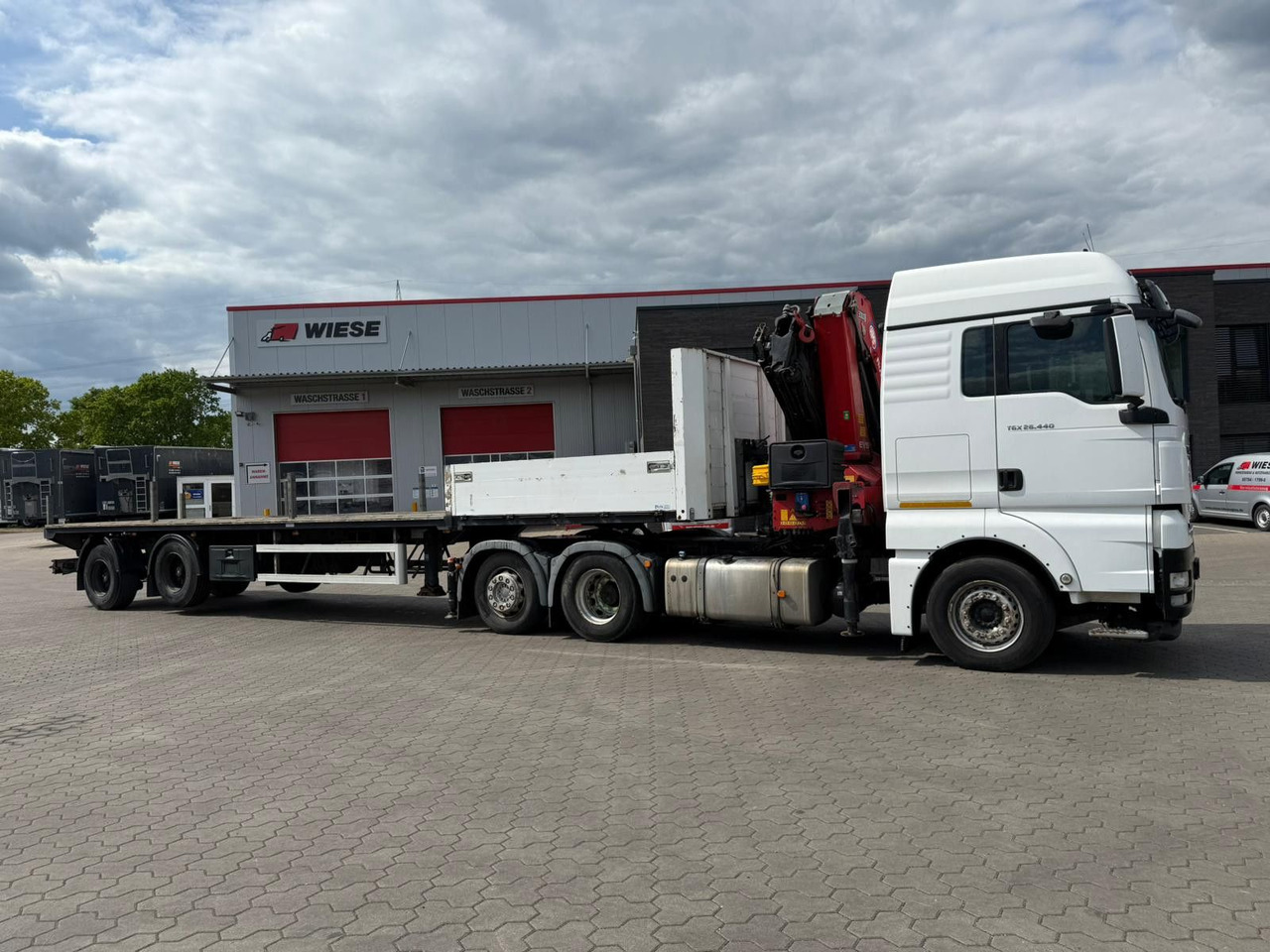 MAN TGX 26.440 6x2 mit HMF 3000-5 Kran - Tegljač: slika 4 MAN TGX 26.440 6x2 mit HMF 3000-5 Kran - Tegljač: slika 4