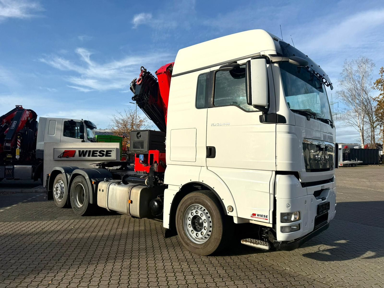 MAN TGX 26.440 6x2 mit HMF 3000-K5 Kran Top Zustand - Tegljač: slika 3 MAN TGX 26.440 6x2 mit HMF 3000-K5 Kran Top Zustand - Tegljač: slika 3