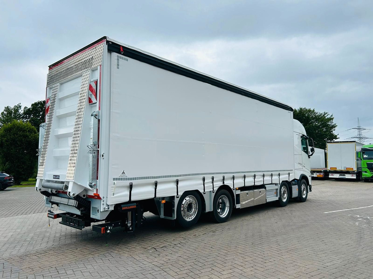 Volvo FH 500 Gabelstaplertransporter LBW Dhollandia 9t - Kamion sa ceradom: slika 2 Volvo FH 500 Gabelstaplertransporter LBW Dhollandia 9t - Kamion sa ceradom: slika 2