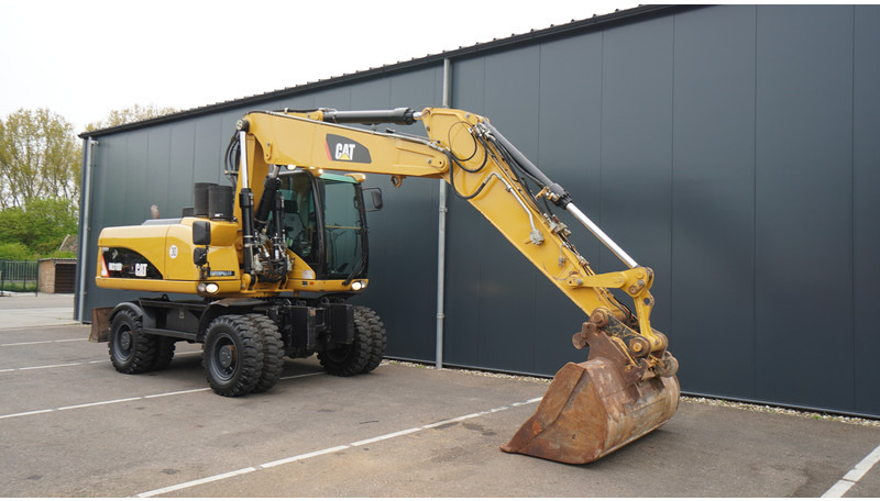 Caterpillar M318D 4X4 WHEELED EXCAVATOR - Građevinska mašina: slika 4 Caterpillar M318D 4X4 WHEELED EXCAVATOR - Građevinska mašina: slika 4