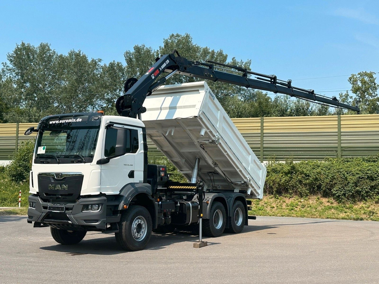 MAN TGS 33.440 6x4 /3-Seiten- Kipper / HIAB 228-6 - Istovarivač, Kamion sa dizalicom: slika 1 MAN TGS 33.440 6x4 /3-Seiten- Kipper / HIAB 228-6 - Istovarivač, Kamion sa dizalicom: slika 1
