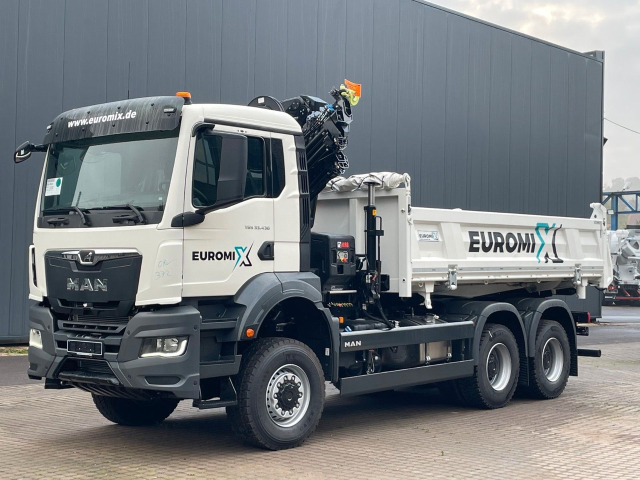 MAN TGS 33.440 6x6 /3-Seiten- Kipper / HIAB 228-6 - Istovarivač, Kamion sa dizalicom: slika 3 MAN TGS 33.440 6x6 /3-Seiten- Kipper / HIAB 228-6 - Istovarivač, Kamion sa dizalicom: slika 3