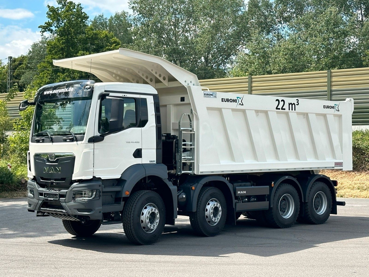 MAN TGS 41.400 8x4 / EUROMIX MTP 22m³/ Eckige Mulde - Istovarivač: slika 1 MAN TGS 41.400 8x4 / EUROMIX MTP 22m³/ Eckige Mulde - Istovarivač: slika 1
