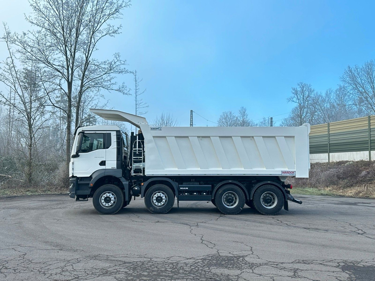 MAN TGS 41.400 8x4 / EUROMIX MTP 23m³/ Eckige Mulde - Istovarivač: slika 2 MAN TGS 41.400 8x4 / EUROMIX MTP 23m³/ Eckige Mulde - Istovarivač: slika 2