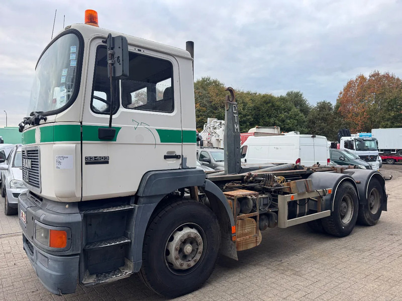 MAN 33.403 **BELGIAN TRUCK-FULL STEEL-MANUAL PUMP** - Kamion sa hidrauličnom kukom: slika 1 MAN 33.403 **BELGIAN TRUCK-FULL STEEL-MANUAL PUMP** - Kamion sa hidrauličnom kukom: slika 1