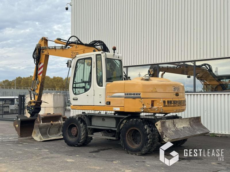 Liebherr A312 Litronic - Bager točkaš: slika 2 Liebherr A312 Litronic - Bager točkaš: slika 2