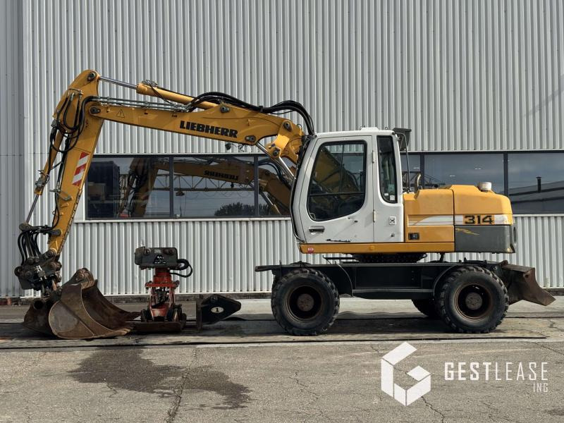 Liebherr A314 Litronic - Bager točkaš: slika 2 Liebherr A314 Litronic - Bager točkaš: slika 2