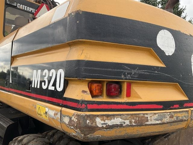 Bager točkaš CAT M320: slika 10
