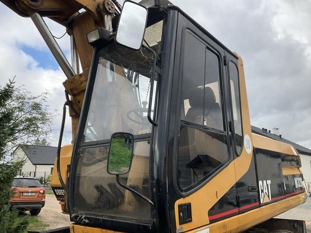 Bager točkaš CAT M320: slika 14
