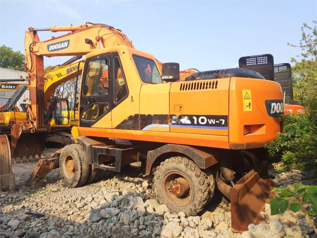 Doosan DH 210 W-7 - Bager točkaš: slika 1 Doosan DH 210 W-7 - Bager točkaš: slika 1