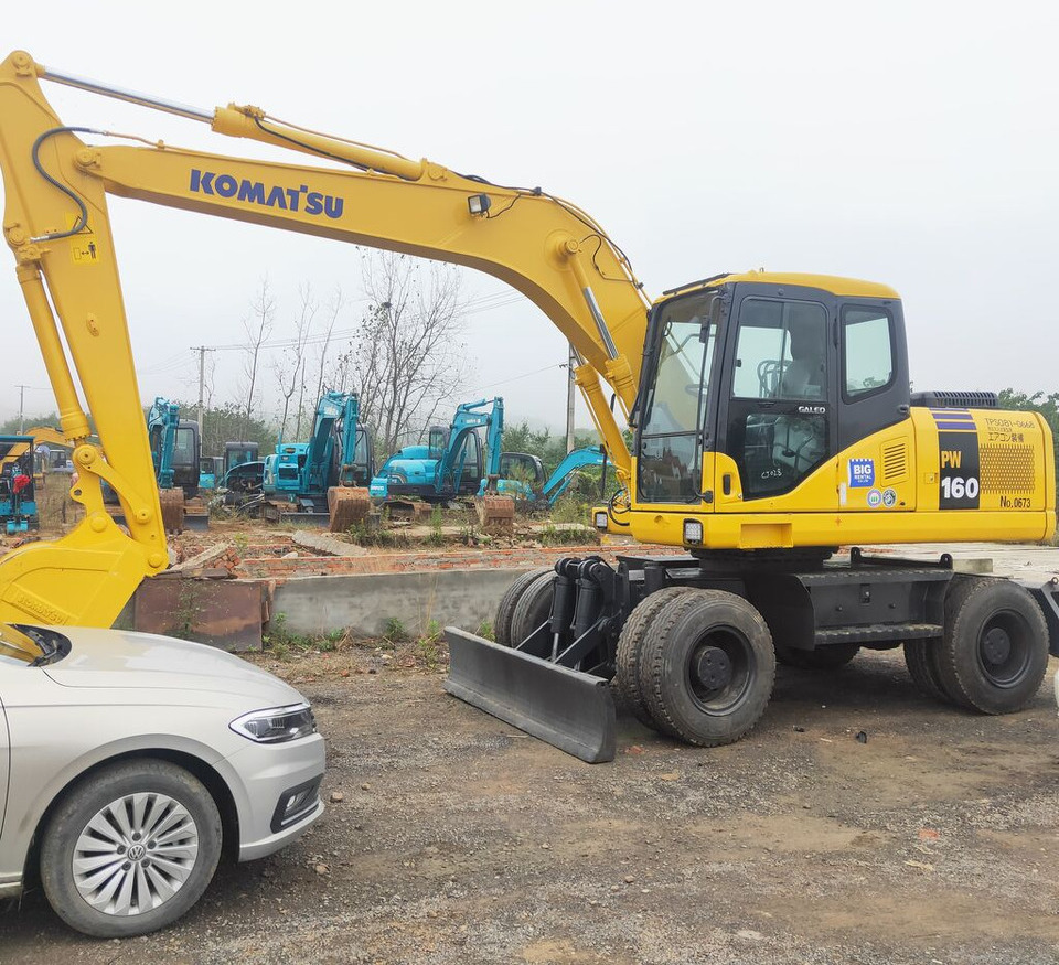 Komatsu PW160 - Bager točkaš: slika 1 Komatsu PW160 - Bager točkaš: slika 1