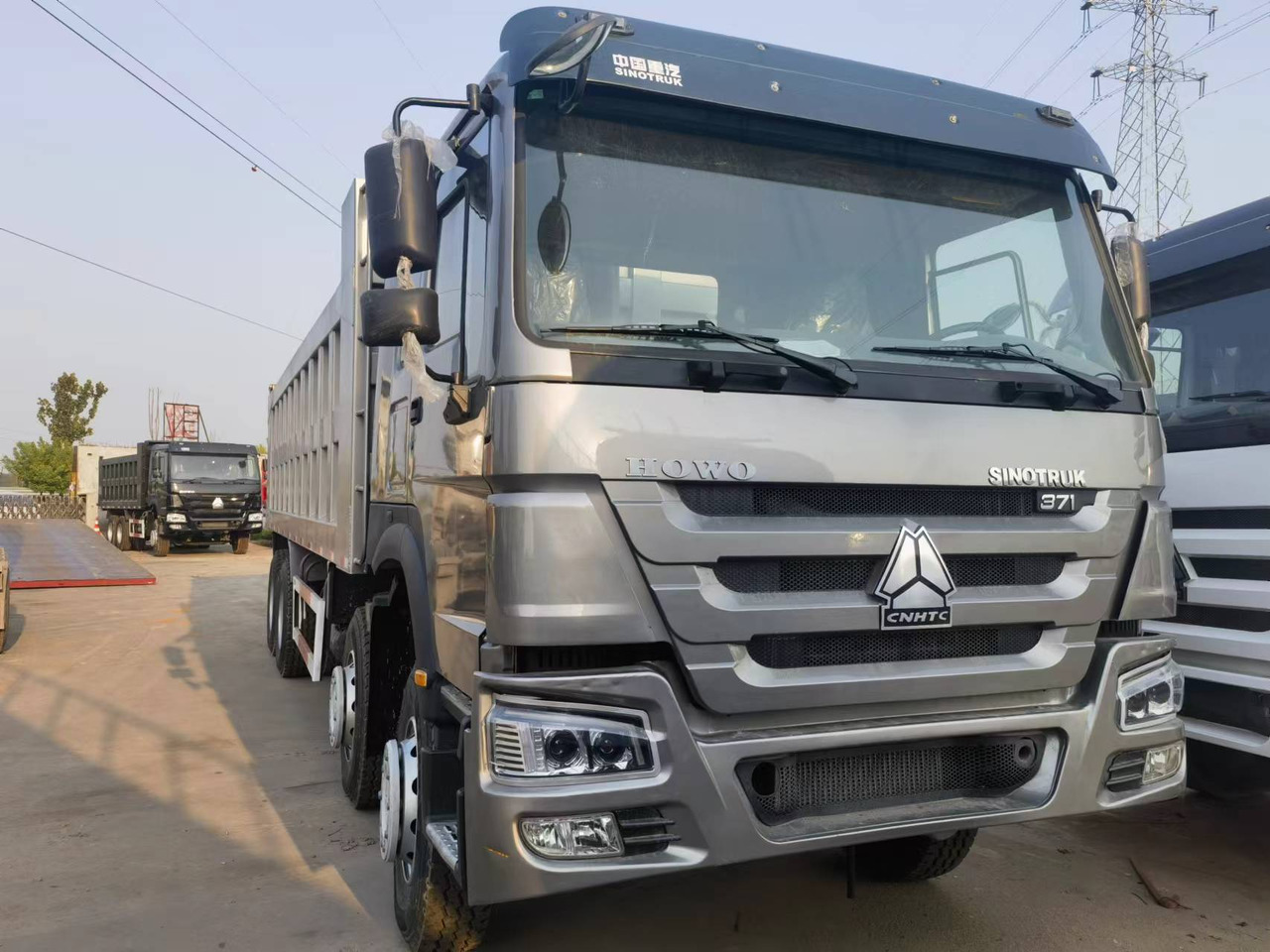Sinotruk HOWO 371 8*4 Dump truck - Istovarivač: slika 1 Sinotruk HOWO 371 8*4 Dump truck - Istovarivač: slika 1