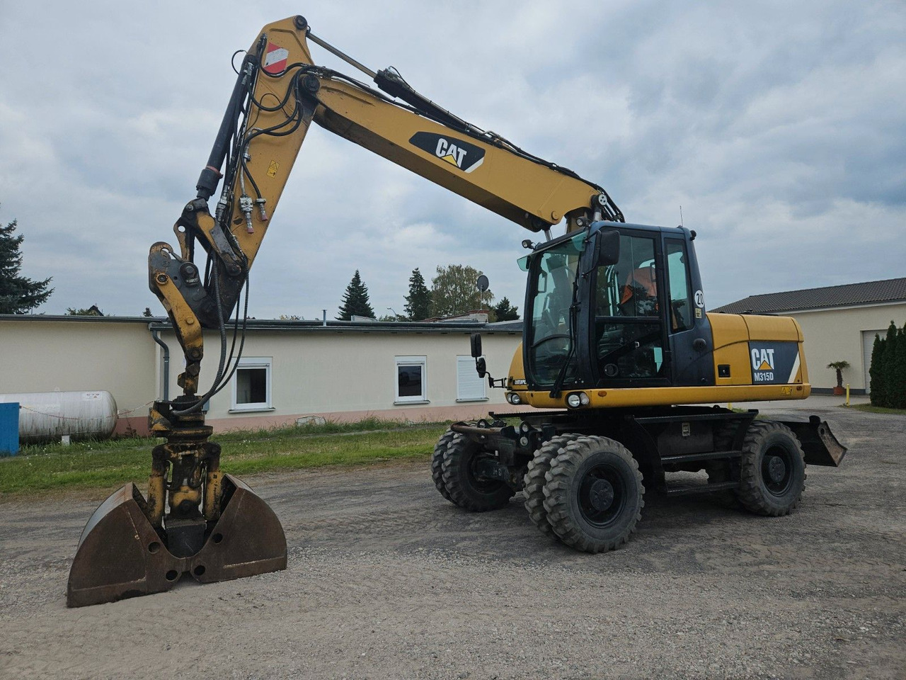 CAT M315D orig. 4.129h - Bager točkaš: slika 1 CAT M315D orig. 4.129h - Bager točkaš: slika 1