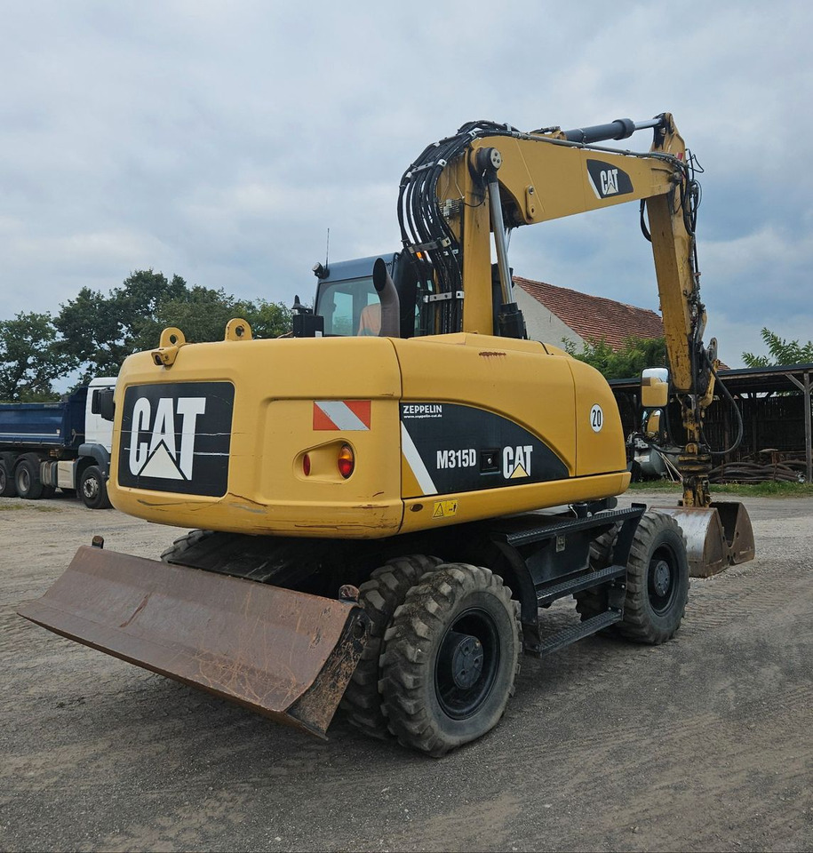CAT M315D orig. 4.129h - Bager točkaš: slika 2 CAT M315D orig. 4.129h - Bager točkaš: slika 2
