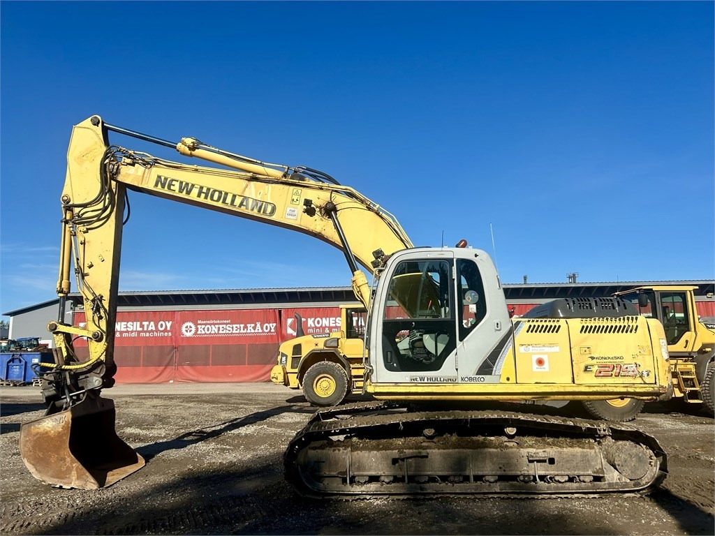 New Holland MYYTY! SOLD! E215B KAUHALLA - Bager guseničar: slika 1 New Holland MYYTY! SOLD! E215B KAUHALLA - Bager guseničar: slika 1