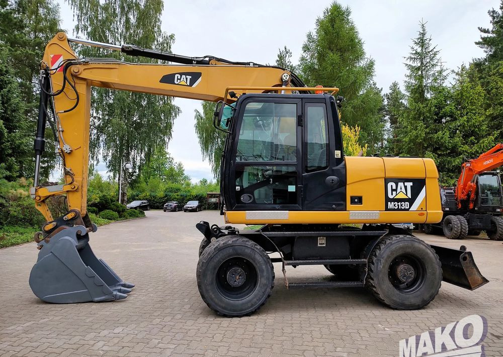 Caterpillar M313D - Bager točkaš: slika 1 Caterpillar M313D - Bager točkaš: slika 1